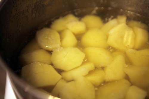Sliced potatoes in a pot