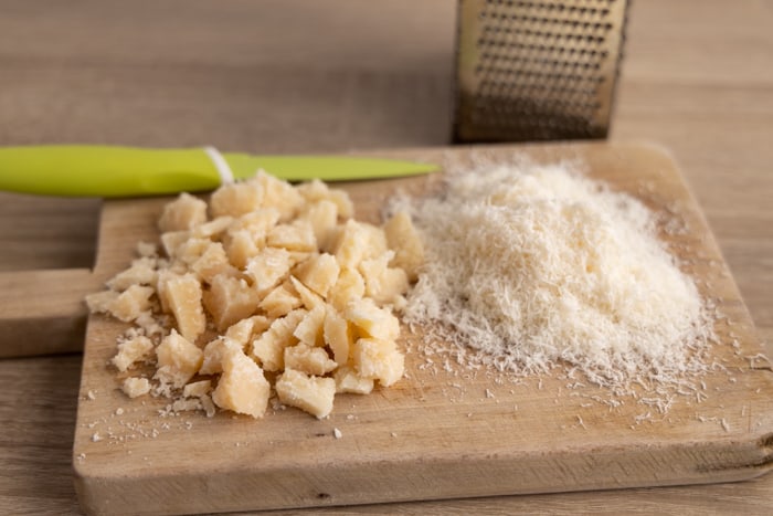 Defrosted parmesan wedge grated and crumbled