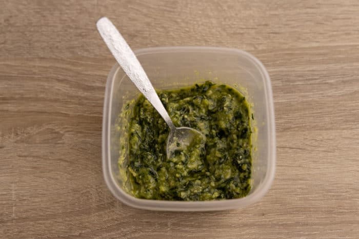 Defrosted pesto after thawing and stirring