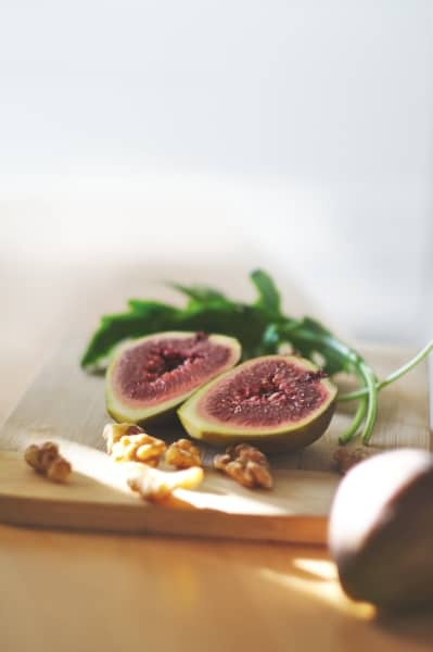 Fig halved on a cutting board