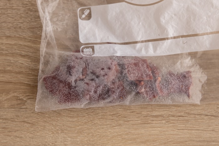Frozen beef jerky in a freezer bag
