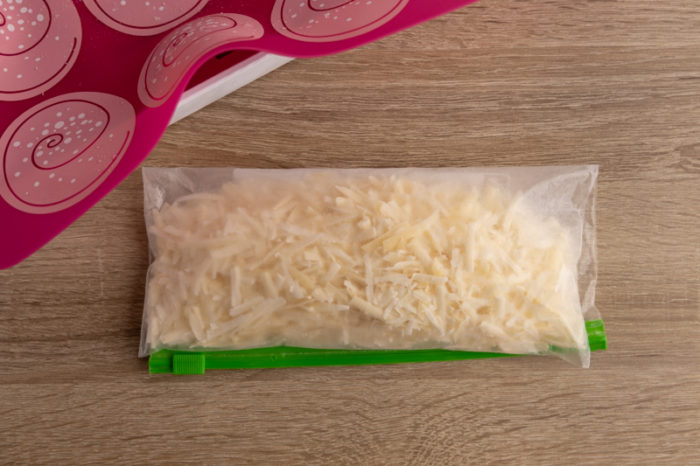 Frozen shredded cheese in a freezer bag