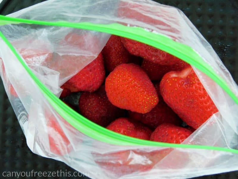 Frozen strawberries in a freezer bag